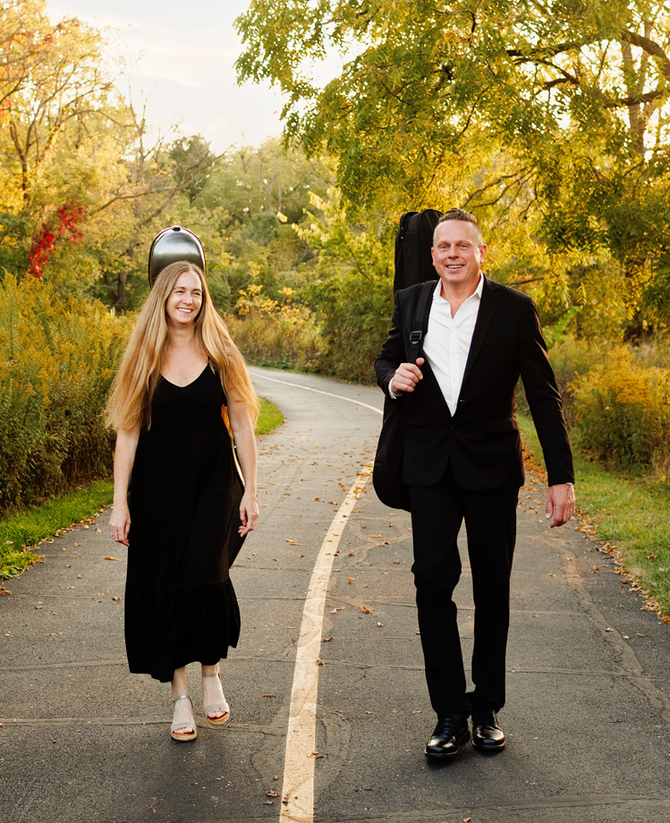 Paul and Karena walking to a gig